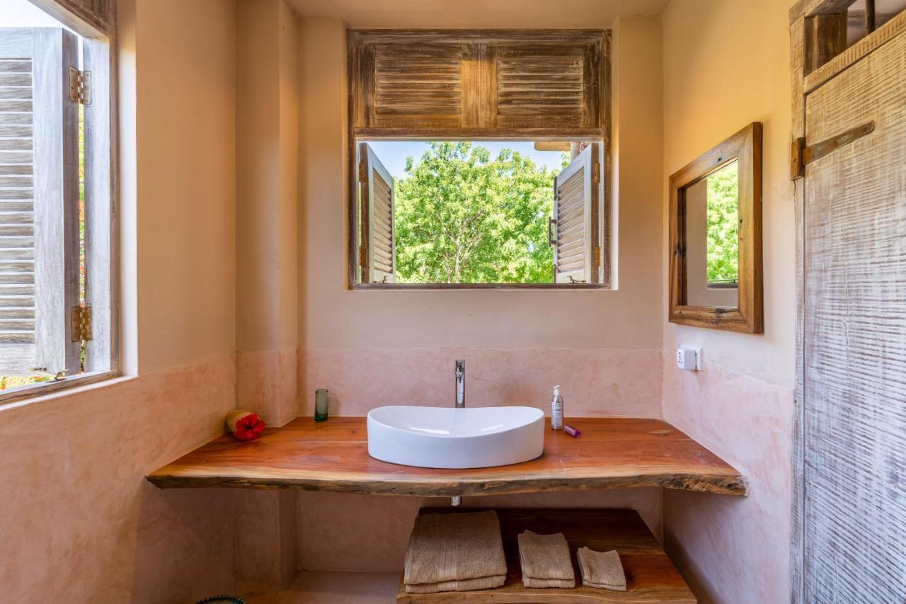 לינה וארוחת בוקר דיאני ביץ' Tombo House מראה חיצוני תמונה