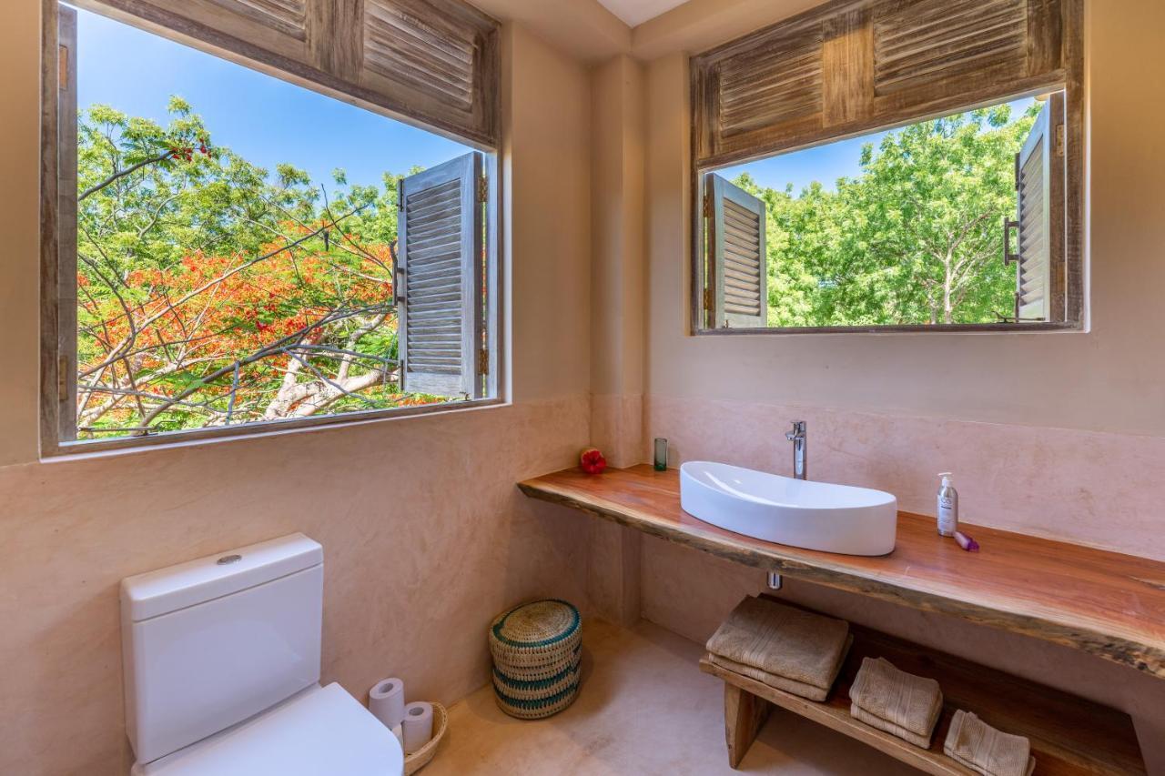 לינה וארוחת בוקר דיאני ביץ' Tombo House מראה חיצוני תמונה
